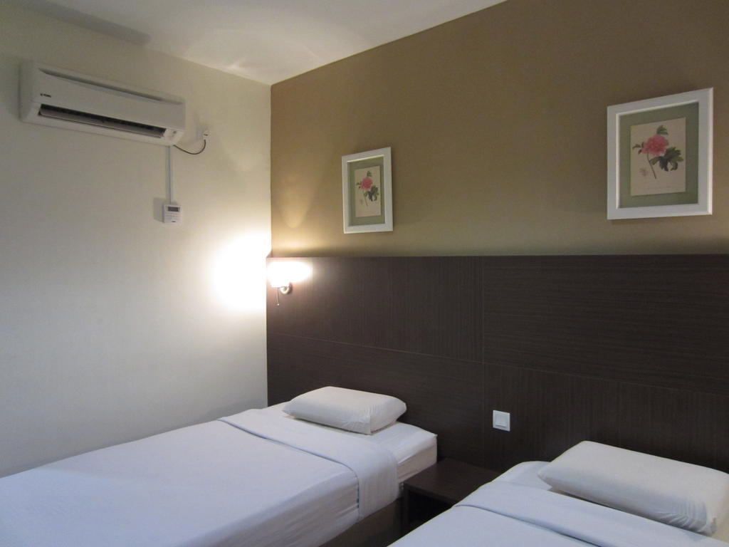 Radiant Hotel Ситиаван Стая снимка