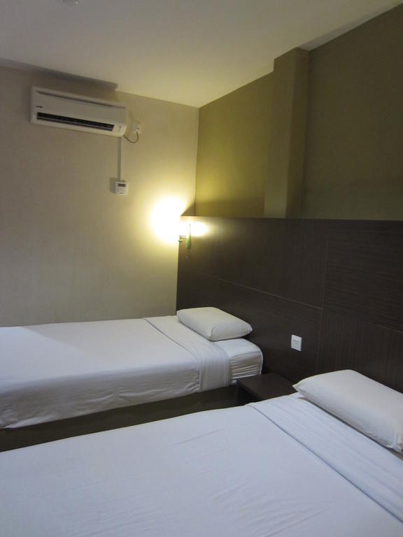 Radiant Hotel Ситиаван Стая снимка